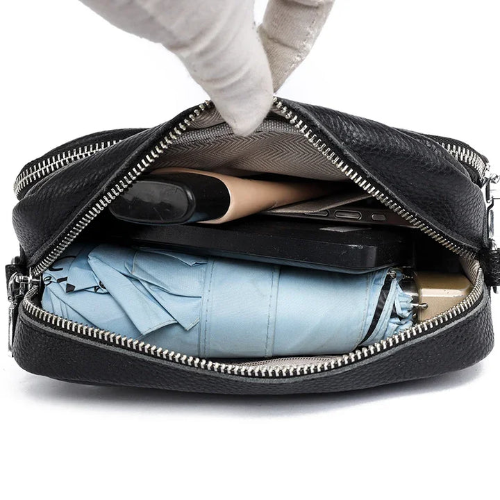 Ione – Unverzichtbarer Luxus  Schultertasche